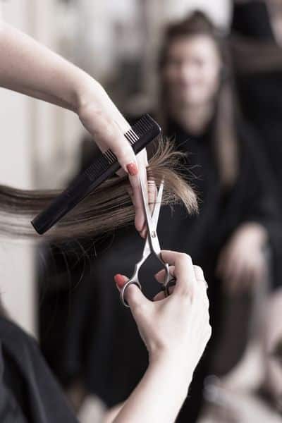 Hair being cut in salon