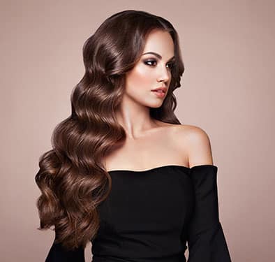 Woman with long hair extensions Woman with long hair extensions