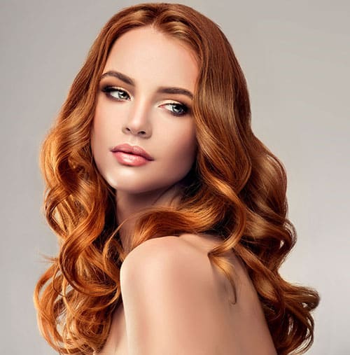 Woman with red hair extensions