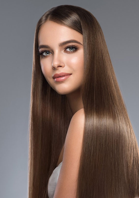 Woman with extremely long smooth hair